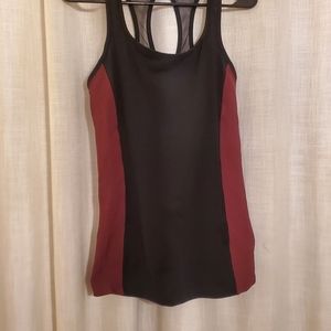 Lucy brand athletic tank with mesh racerback and elastic band chest support.